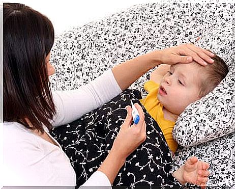 mom takes care of sick child