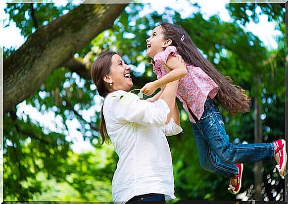 mother playing with her daughter