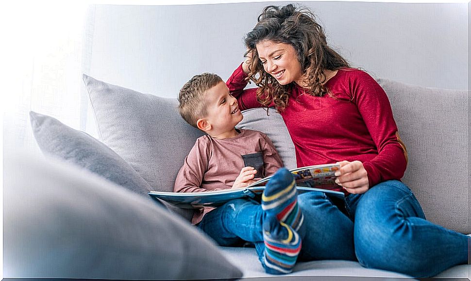 Mother with her son reading books to value friendship.