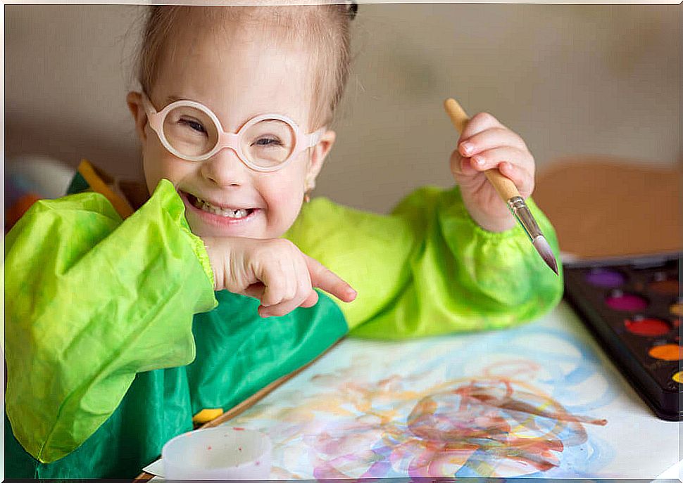 Girl with intellectual disability drawing during quarantine.