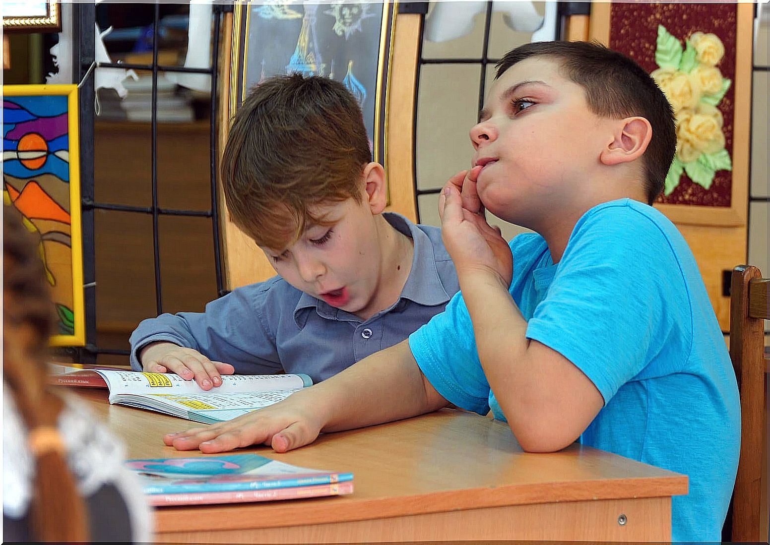 Child biting fingers before using habit reversal to treat nervous tics.