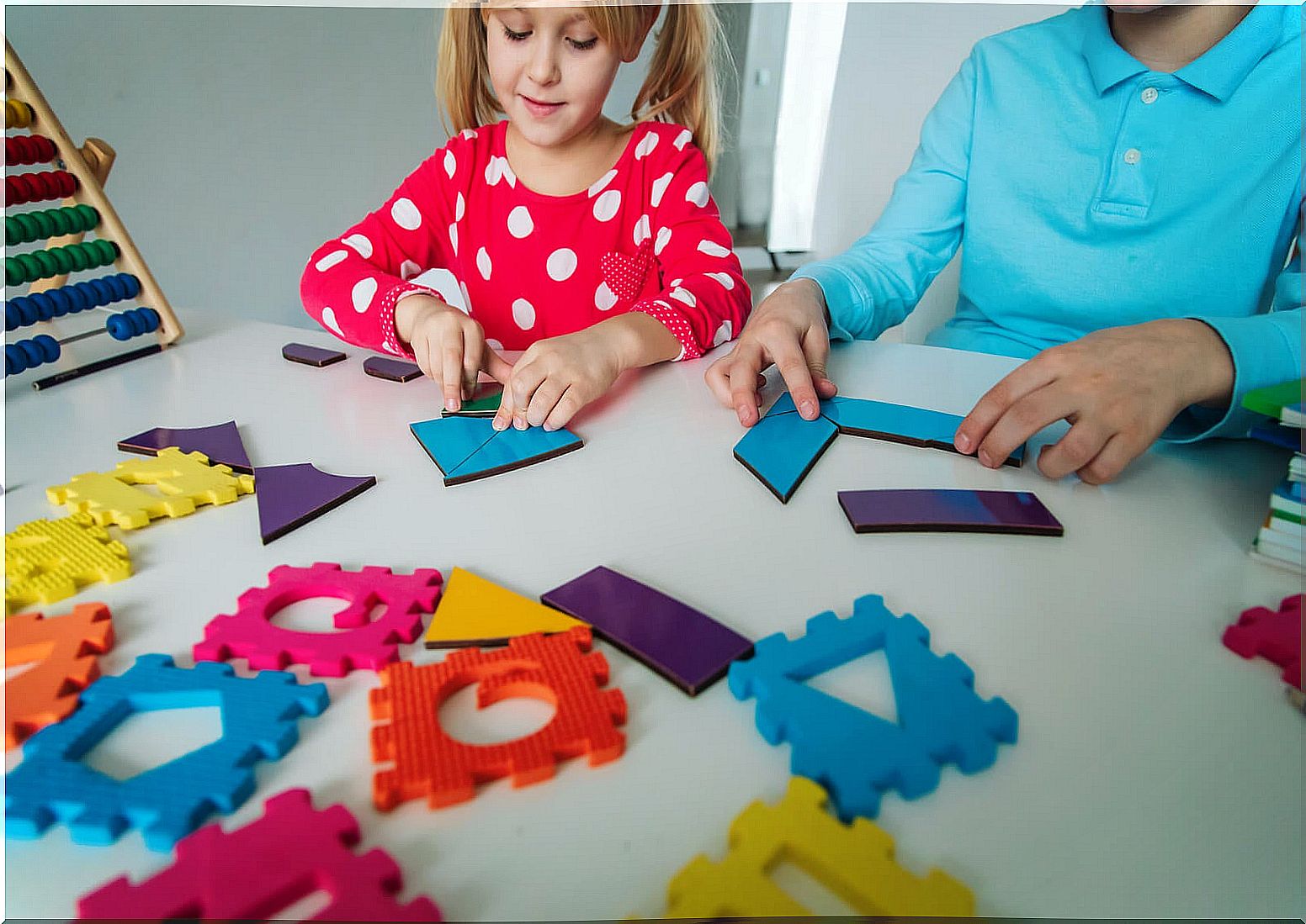 Children learning math skills by playing.