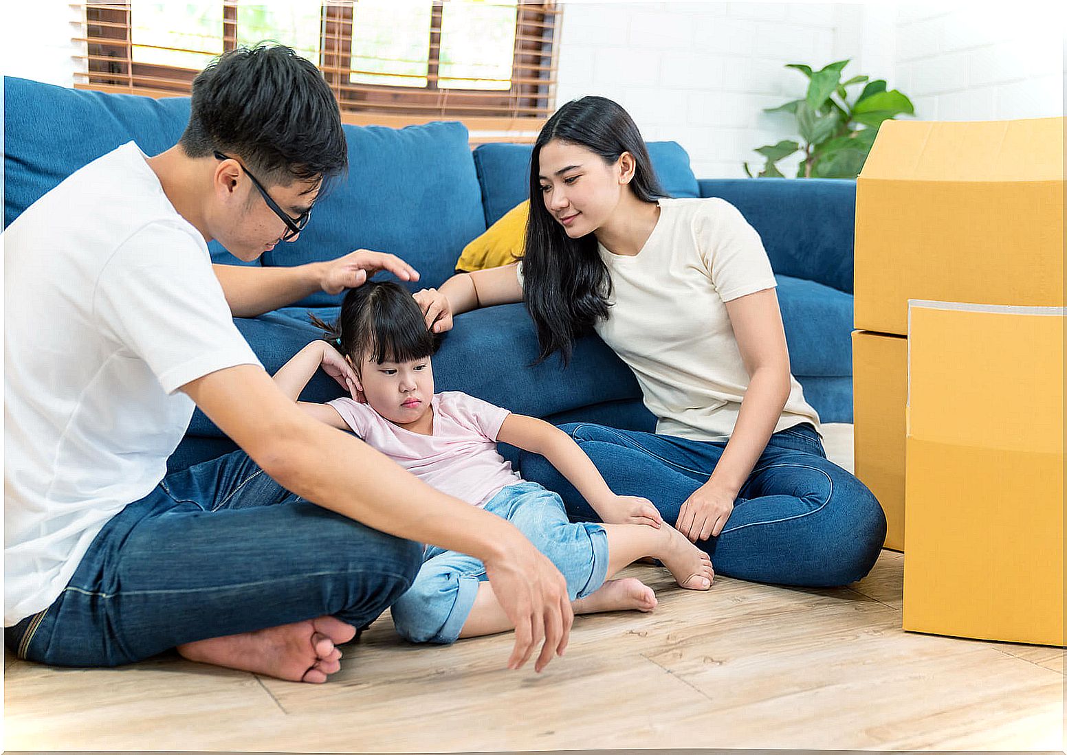 Parents talking with their daughter about how parenting styles affect her strengths.