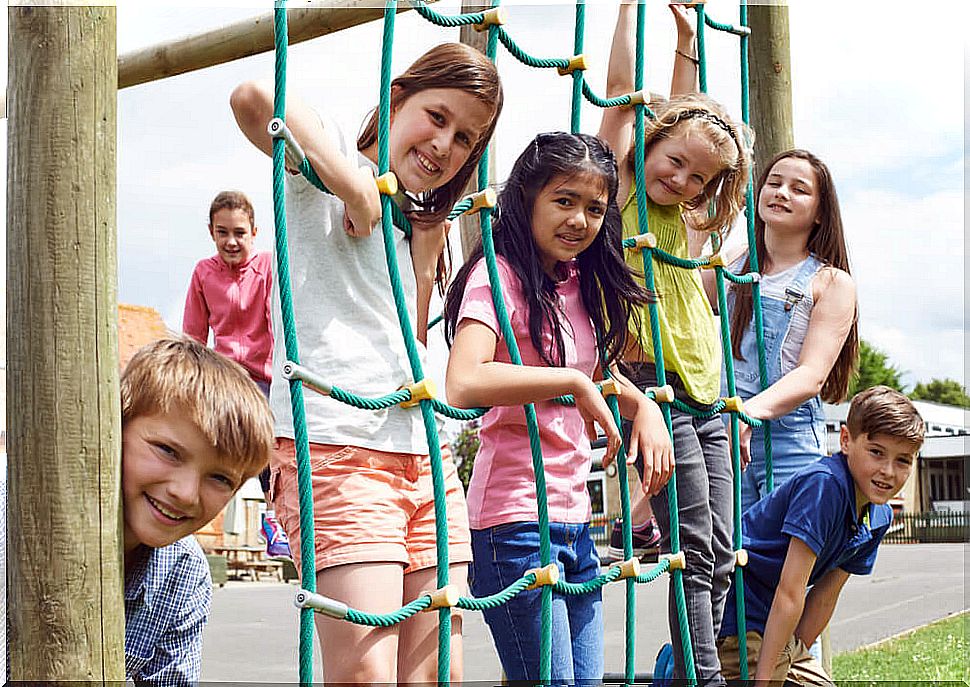 Children at school recess resting.