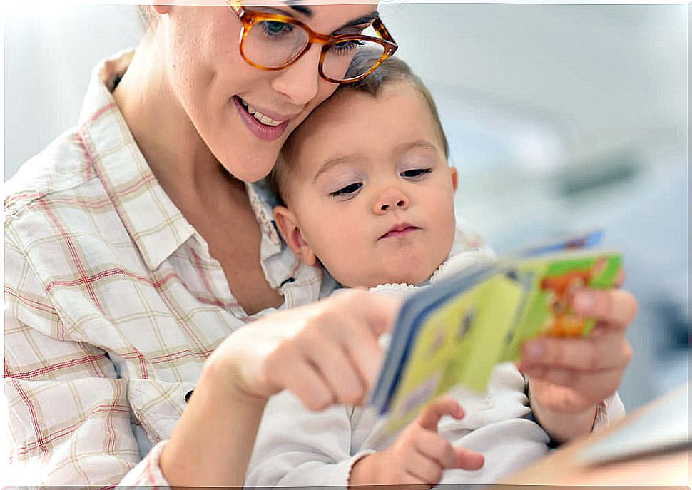 Mom tells a story from the Pi collection to her child.