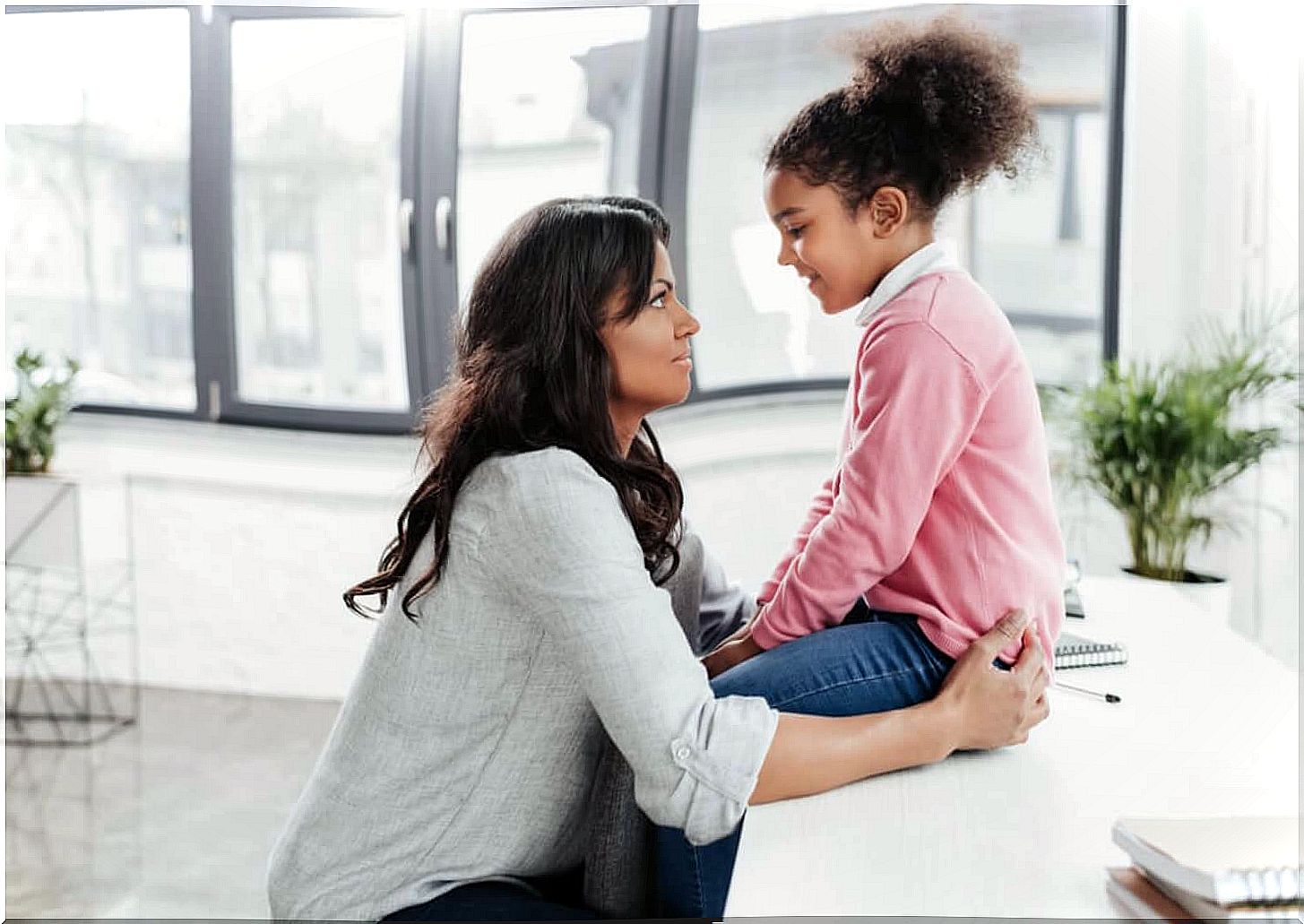 Mother and daughter talking about what to set limits.