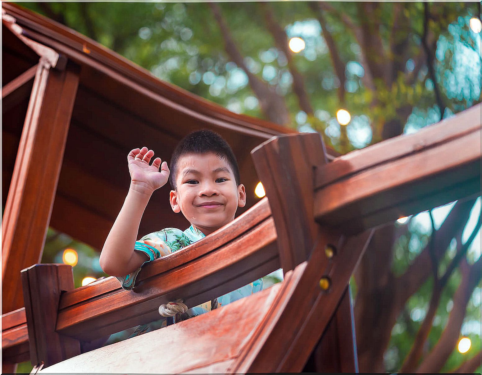 Child playing in a fort as part of unstructured play.